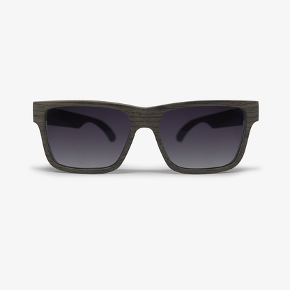 Lentes solares de madera chapada en nogal y arce con lentes grises polarizados. Actitud Optimista.  Los clásicos nunca mueren porque disfrutas de la serenidad y de las cosas sin complicaciones. Lentes Solares de Madera Clásico.